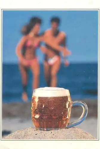 Belgium postcard beach scene couple enjoying the summer and beer
