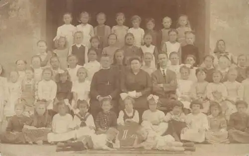 Postcard real photo social history group picture teachers and school children types