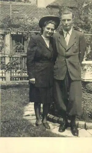 Postcard real photo social history elegant, charming, smiling couple outside the picture