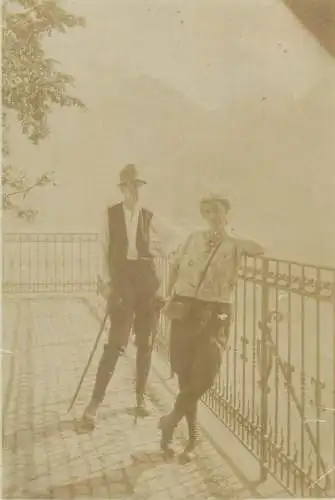 Postcard tourist couple on hotel terrace