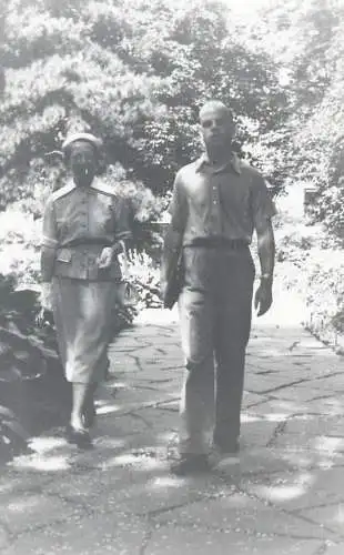 Postcard couple walking in the park