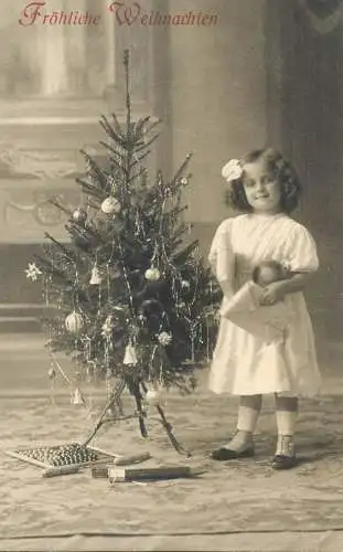 Postcard cute, elegant girl fancy ribbon hairstyle next to decorated Christmas tree Frohliche Weinhachten greetings