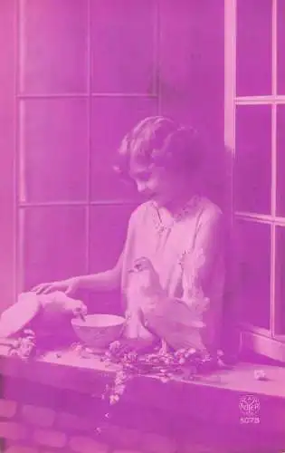 Postcard cute young girl in the window feeding pigeons