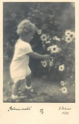Children portrait vintage photo Postcard cute child flower picking in garden detail view