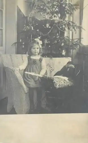 Children portrait vintage photo Postcard cute young girl fancy ribbon hairstyle Christmas tree