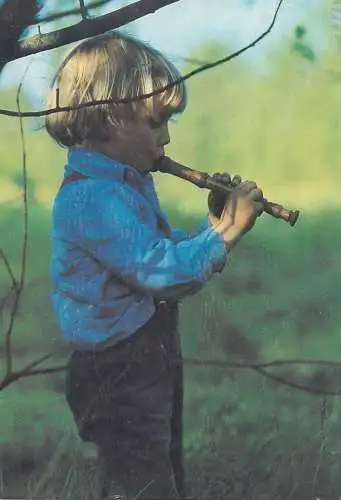 Postcard young boy flute playing
