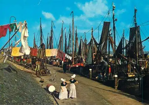 Postcard Netherlands Volendam ethnic types typical costumes fishing boats