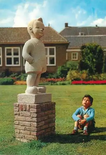Postcard Netherlands Assen young boy looking at a child statue