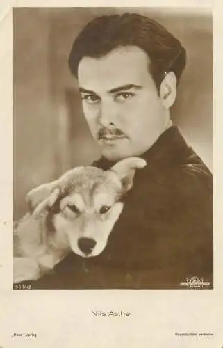 Movie Film start actors Nils Asther and dog postcard