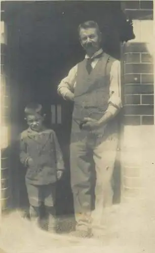 Postcard father and his son