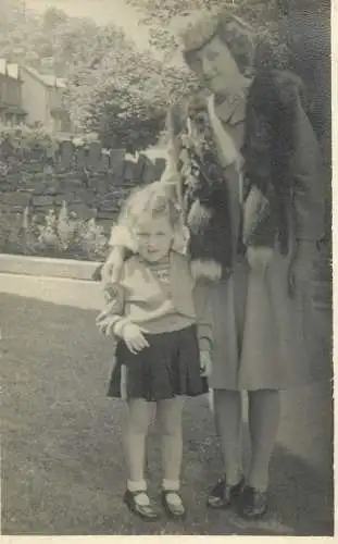 Postcard mother and her daughter outdoor scenery