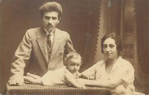 1923 Postcard parents and their little child family group photo