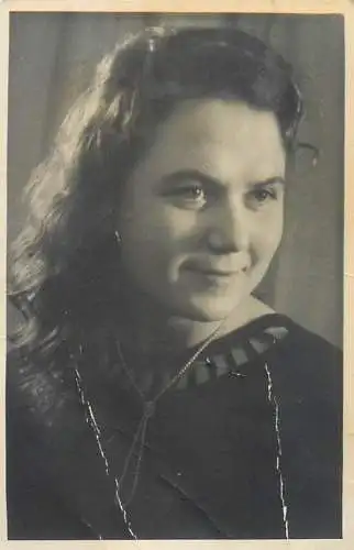 Anonymous persons woman souvenir photo