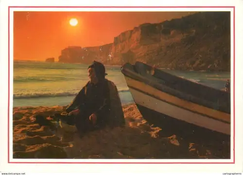 A5314 Portugal Nazare old man on the beach at sunset