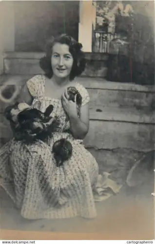 Anonymous persons woman holding hen chicks