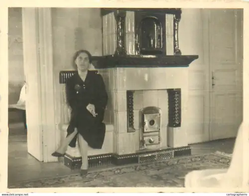 Anonymous persons woman posing near chimney