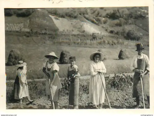 Anonymous persons farming photo