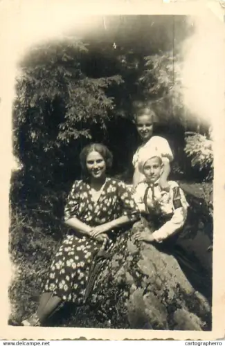 Anonymous persons family group souvenir photo