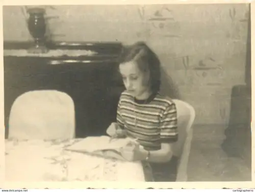Anonymous persons girl reading snapshot photo
