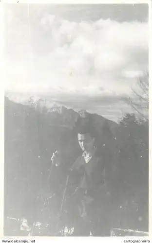 Anonymous persons excursionist tripping souvenir photo