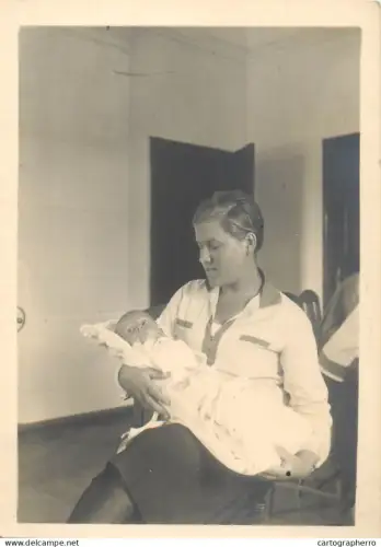 A5787 Anonymous persons photo woman and baby dated 1928 (trimmed postcard)