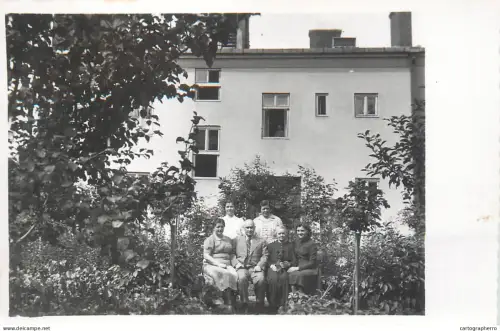 A5787 Souvenir photo postcard anonymous persons family group Romania place to identify
