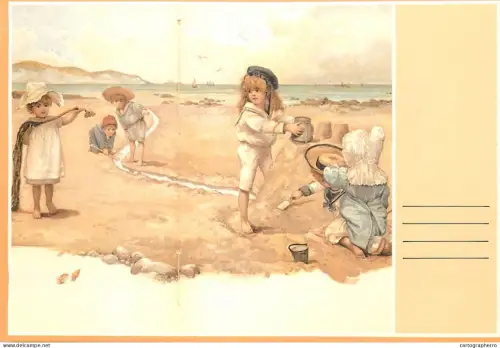 A5412 Children types at the beach making sand castles