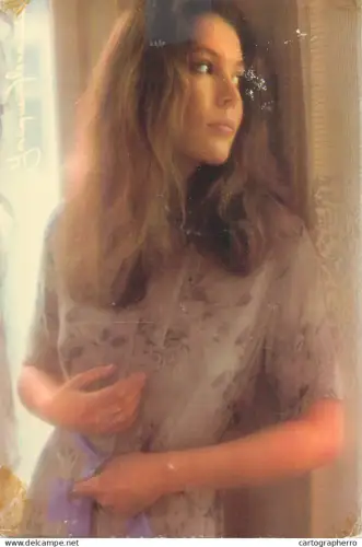 A5607 Beautiful woman looking through a window