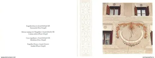 A6099 Sundial painted on the wall of a traditional Engadine house in Scuol, Switzerland