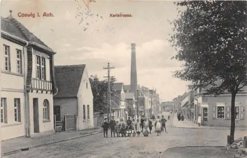 Coswig Anhalt Karlstrasse Laden, Schulkinder Postkarte 1913