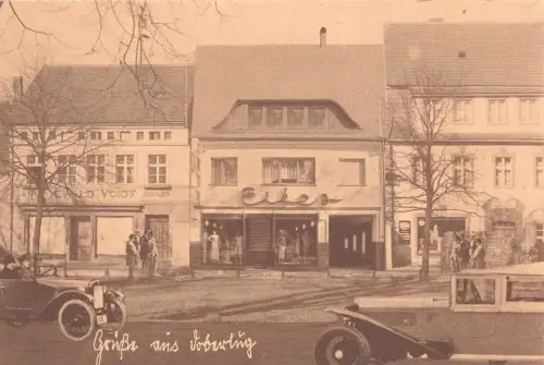 AK Doberlug - Kirchhain Hauptstrasse Textilwaren 1920 Postkarte