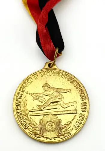 DDR VP Medaille Bestenermittlung in Körperkultur und Sport in Gold