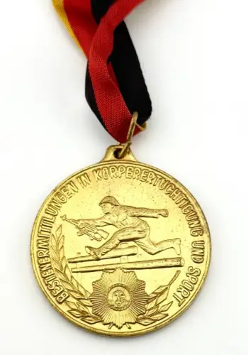 DDR VP Medaille Bestenermittlung in Körperkultur und Sport in Gold