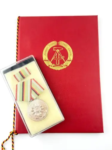 DDR Verdienstmedaille der Organe des MdI Bronze Urkunde 1986 Oberleutnant der VP