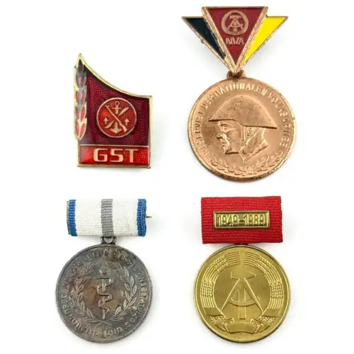 DDR Konvolut 4 Stück Abzeichen Orden Medaillen East German Badge NVA MdI SED #7