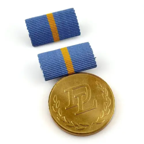DDR Medaille hervorragende Leistungen Kommunalwirtschaftliche Dienstleistungen