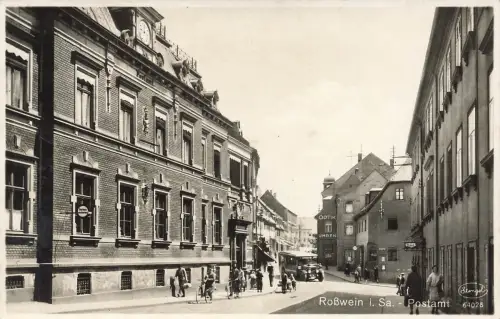 AK Roßwein Postamt Optik Uhren Bank Sachsen 1942 gelaufen Postkarte