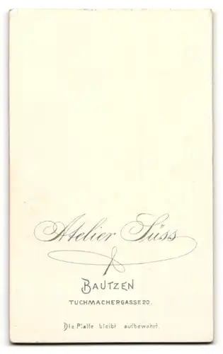 Fotografie Atelier Süss, Bautzen, Portrait Kleinkind in kariertem Kleid