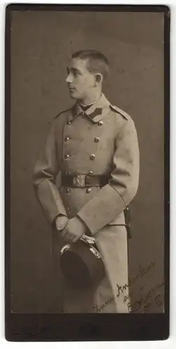 Fotografie Ferd. Grega, Wien, junger österreichischer Soldat in K.u.k. Uniform mit Mantel