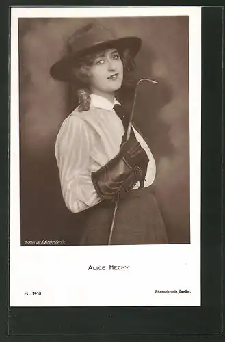 AK Schauspielerin Alice Hechy mit Hut und Eisenstange