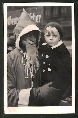 Foto-AK Weihnachtsmann mit kleinem Jungen auf dem Arm