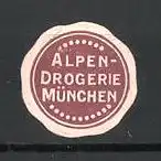 Präge-Reklamemarke Alpen-Drogerie München