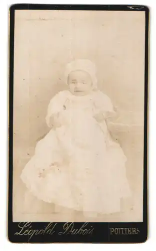 Fotografie Leopold Dubois, Poitiers, lächelndes Baby mit Mütze