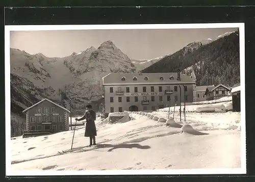 AK Travoi, Hotel Bella Vista im Schnee mit Frau auf Skiern