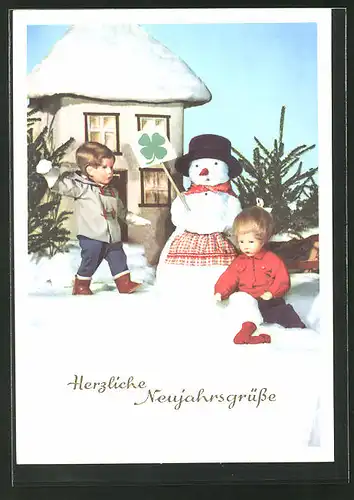 AK Käthe Kruse-Puppen bauen einen Schneemann