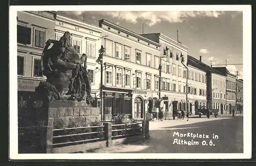 AK Altheim, Marktplatz mit Spezerei und Denkmal