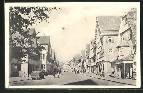 AK Welzheim, Wilhelmstrasse mit Geschäften