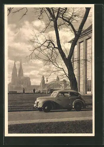 AK Köln a. Rh., Ford-Auto in Deutz mit Blick zum Dom