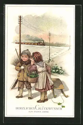 AK Neujahrsgruss, Junge und Mädchen mit Schlitten und Korb Glücksklee