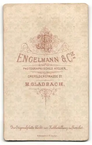 Fotografie Engelmann & Cie., M.-Gladbach, Portrait halbwüchsiger Knabe mit zurückgekämmtem Haar